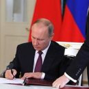 Путин подписал закон о въезде иностранцев по электронным визам в аэропорты ДФО
